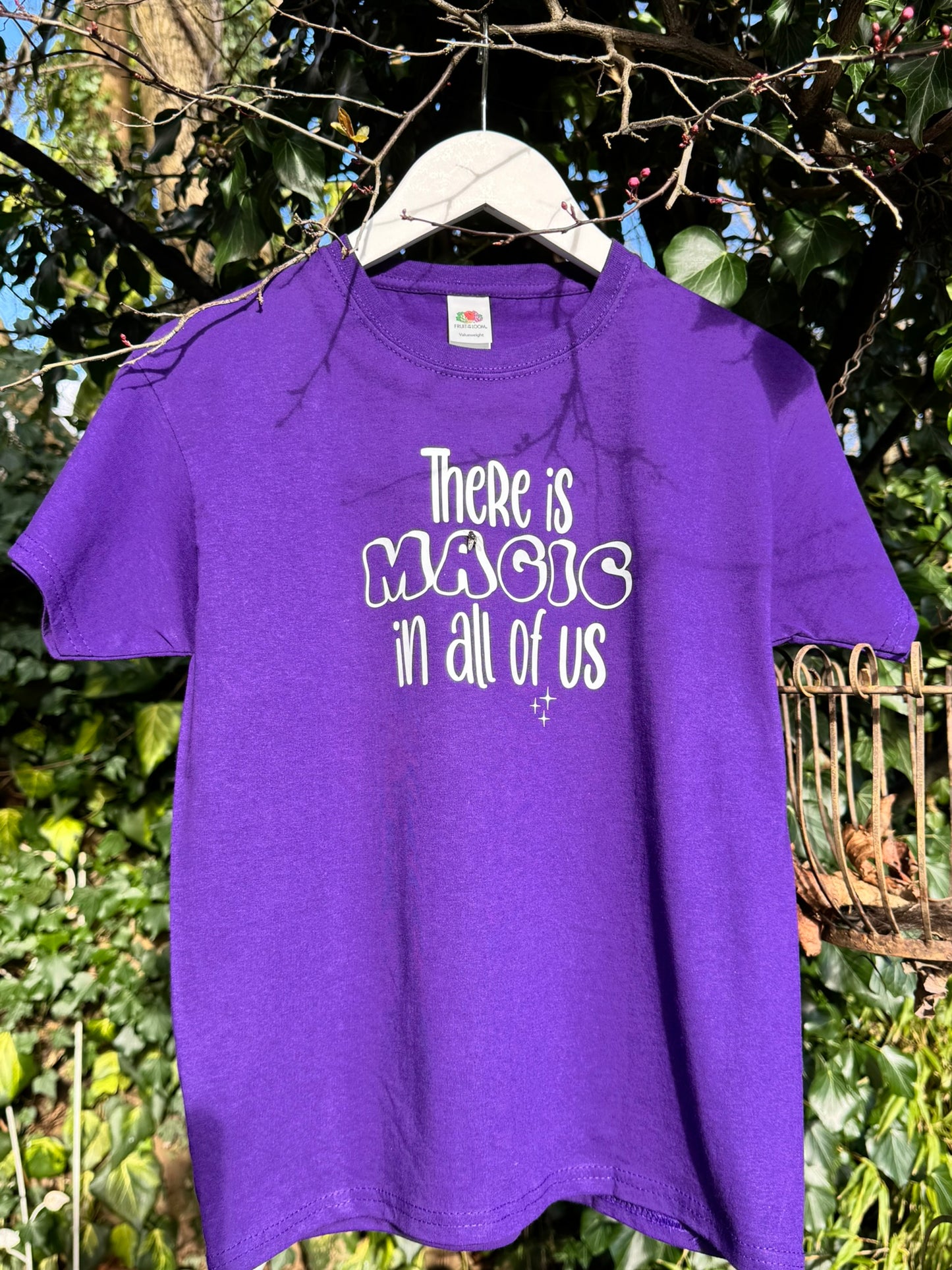 "There is MAGIC in all of us" purple slogan kids t-shirt