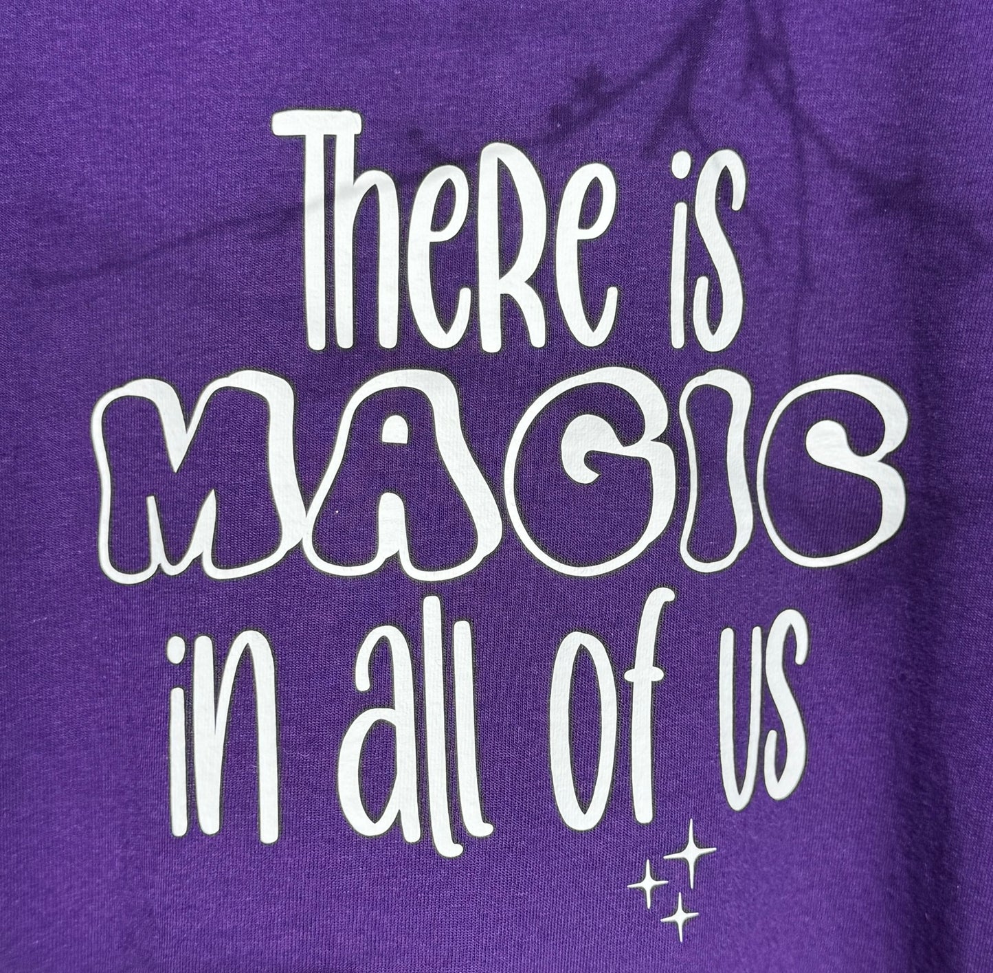 "There is MAGIC in all of us" purple slogan kids t-shirt