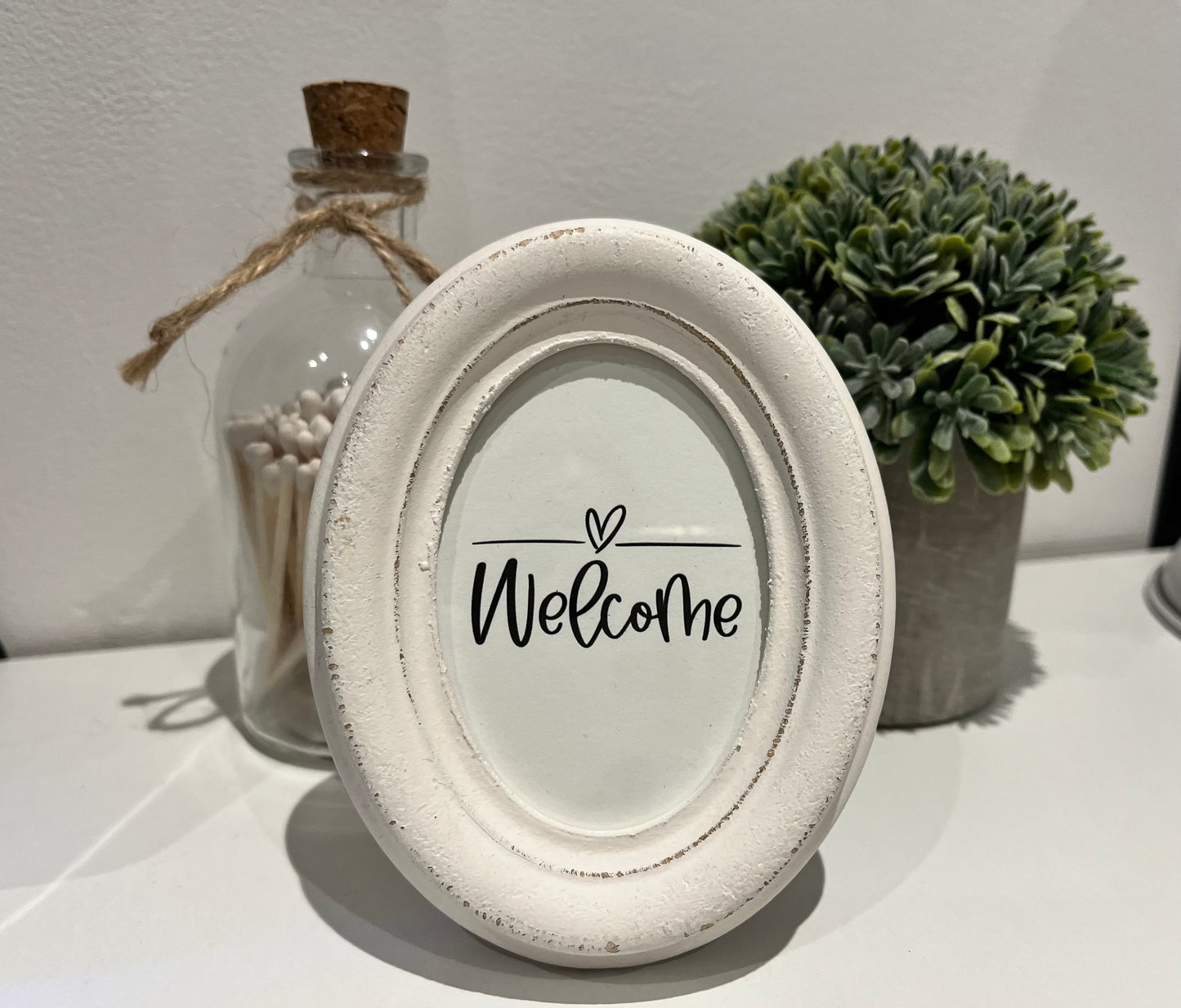 Vintage oval frame with slogan