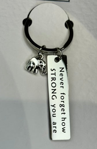 NEVER FORGET HOW STRONG YOU ARE keychain