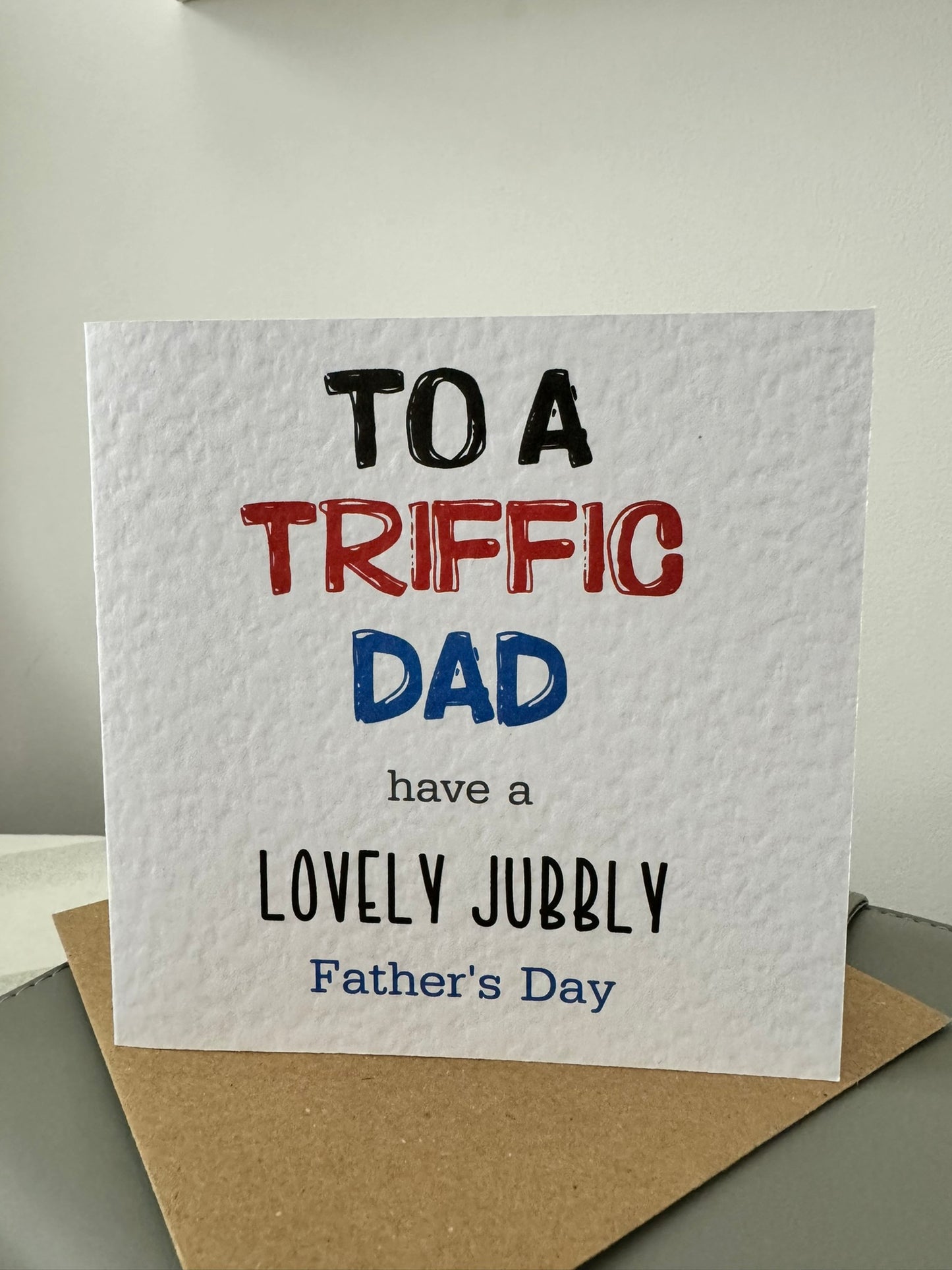 Handcrafted "TO A TRIFFIC DAD HAVE A LOVELY JUBBLY FATHER'S DAY" square card