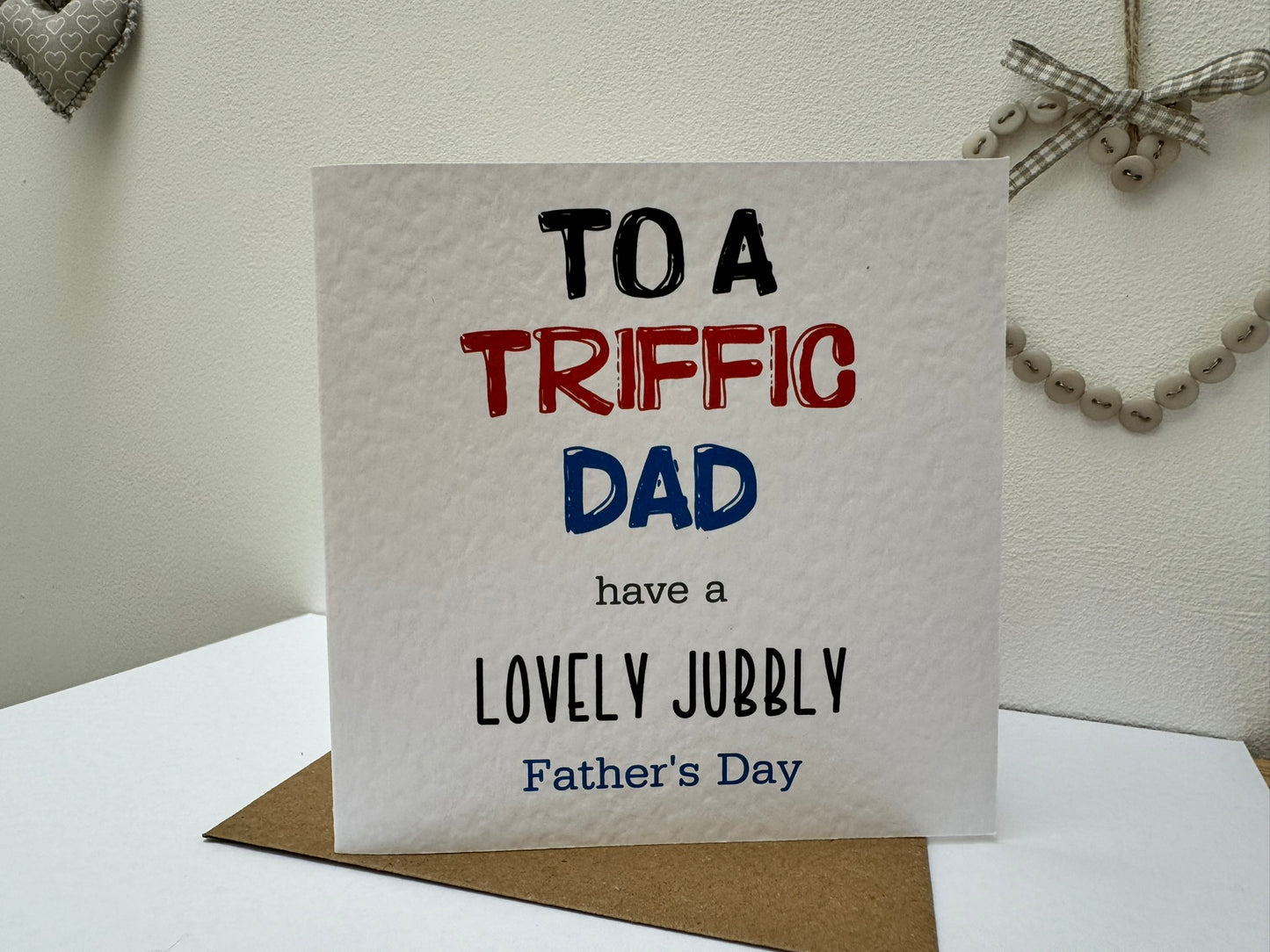 Handcrafted "TO A TRIFFIC DAD HAVE A LOVELY JUBBLY FATHER'S DAY" square card